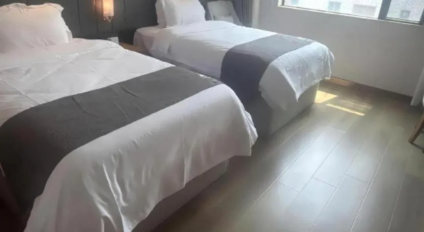 Bed in Gya Hotel Zhuhai International Airport New Town