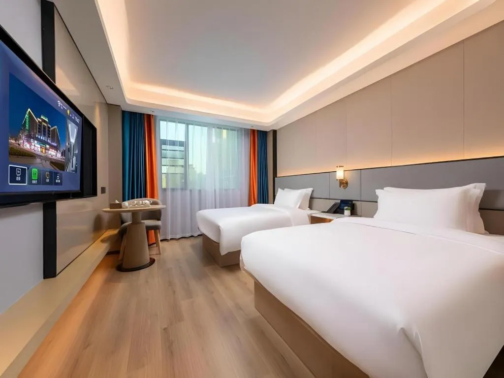 Bed in Gya Hotel Zhuhai International Airport New Town