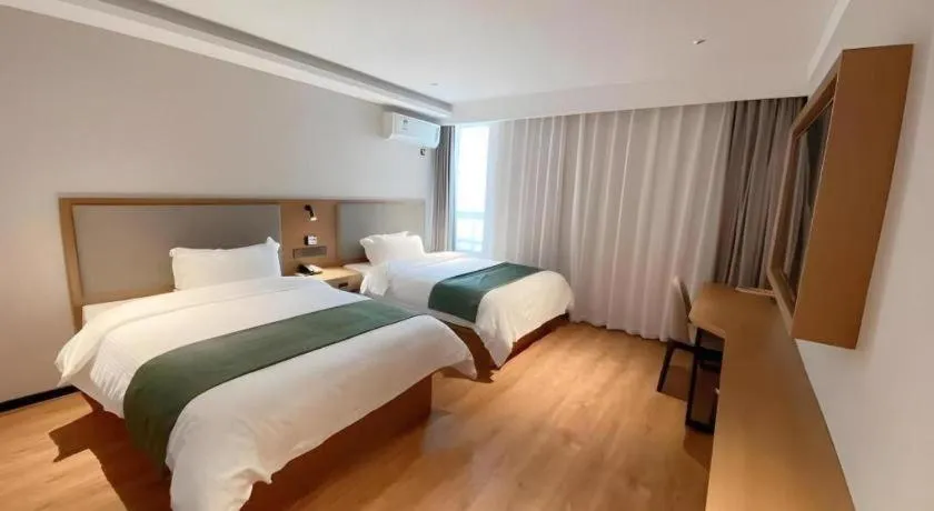Bed in Green Tree Inn Luoyang Fenghuang Mansion Mudan Square Metro Station
