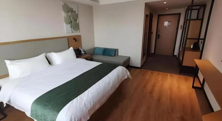 Bed in Green Tree Inn Luoyang Fenghuang Mansion Mudan Square Metro Station