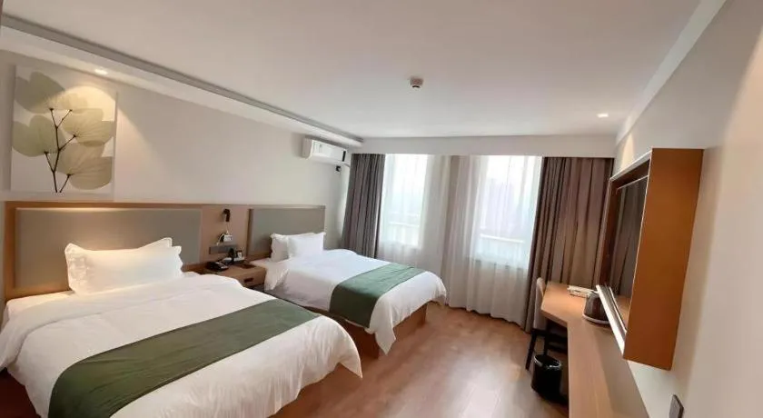 Bed in Green Tree Inn Luoyang Fenghuang Mansion Mudan Square Metro Station