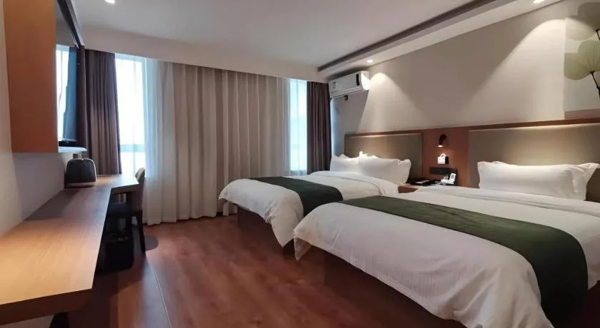 Bed in Green Tree Inn Luoyang Fenghuang Mansion Mudan Square Metro Station