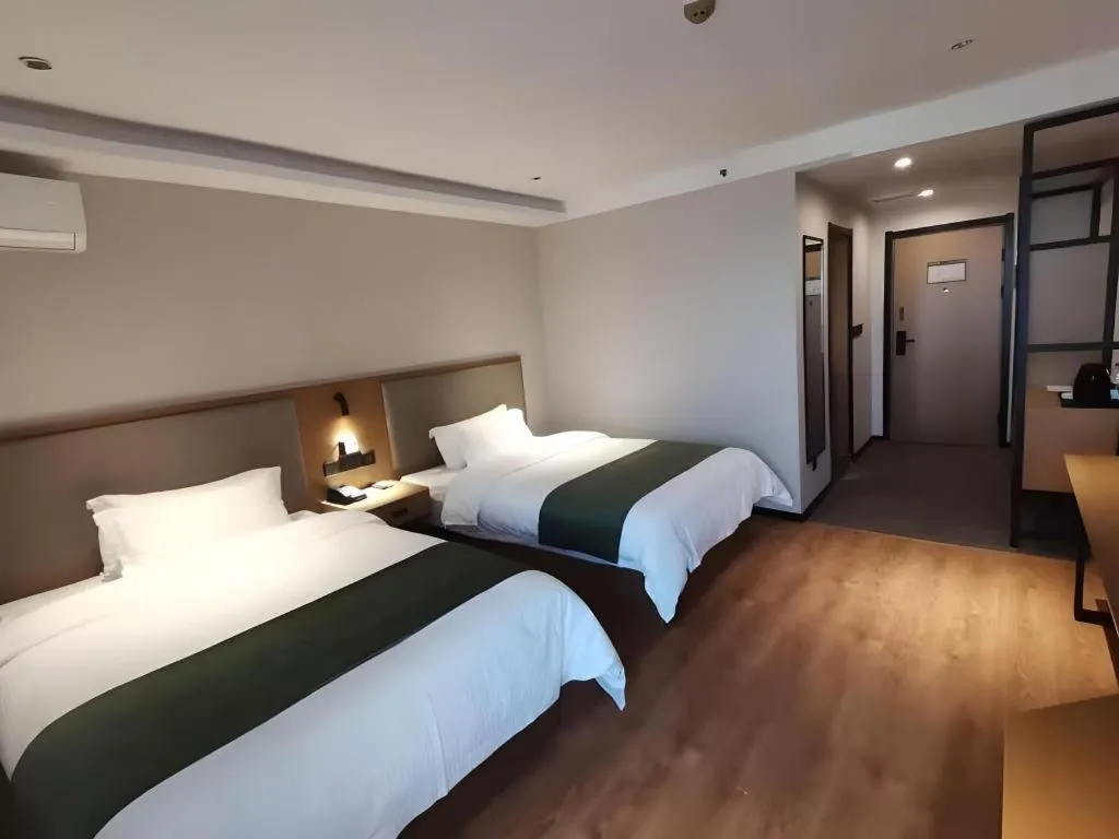 Bed in Green Tree Inn Luoyang Fenghuang Mansion Mudan Square Metro Station