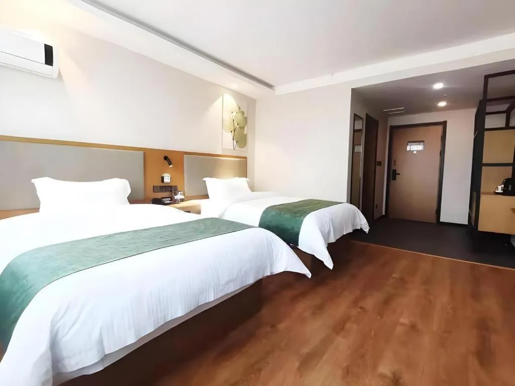Bed in Green Tree Inn Luoyang Fenghuang Mansion Mudan Square Metro Station