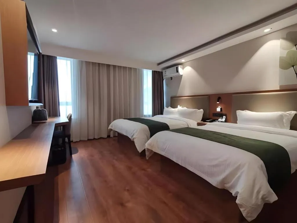 Bed in Green Tree Inn Luoyang Fenghuang Mansion Mudan Square Metro Station