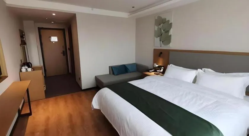 Bed in Green Tree Inn Luoyang Fenghuang Mansion Mudan Square Metro Station