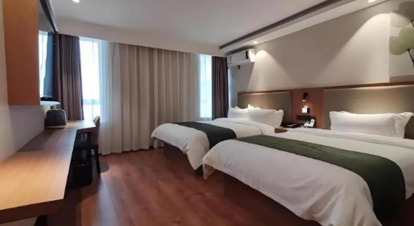 Bed in Green Tree Inn Luoyang Fenghuang Mansion Mudan Square Metro Station