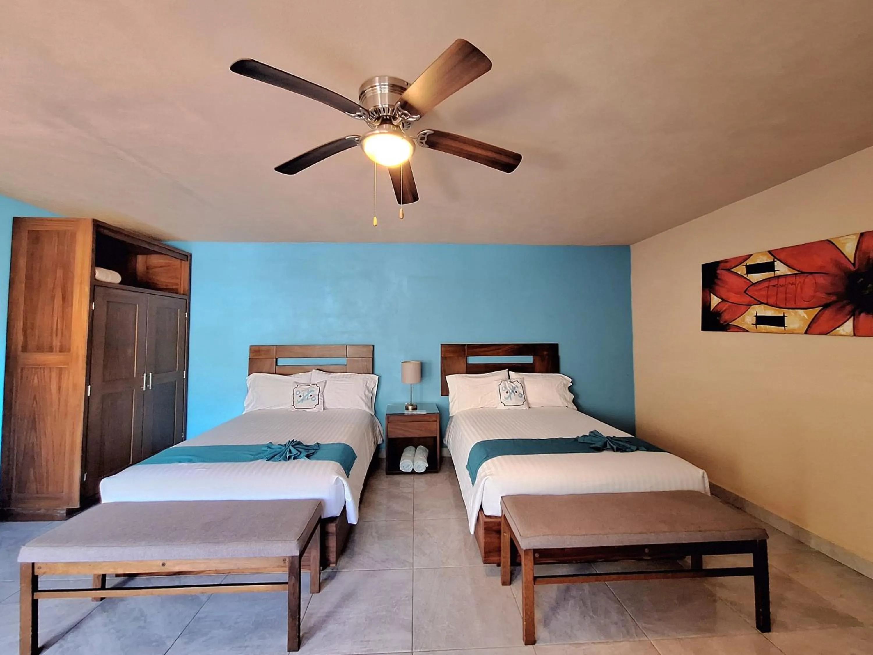 Bed in Pacific Inn hotel