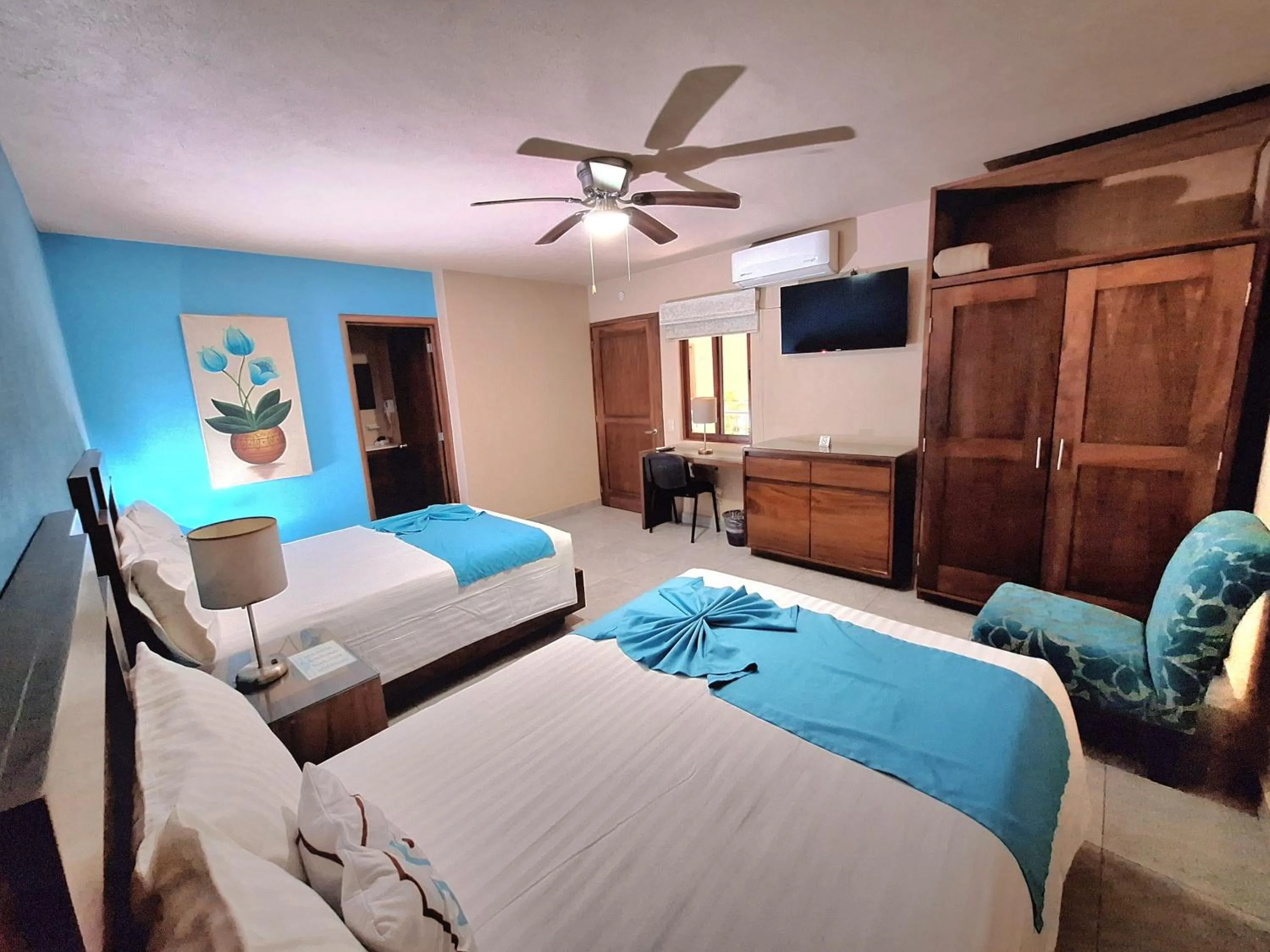 Bed in Pacific Inn hotel