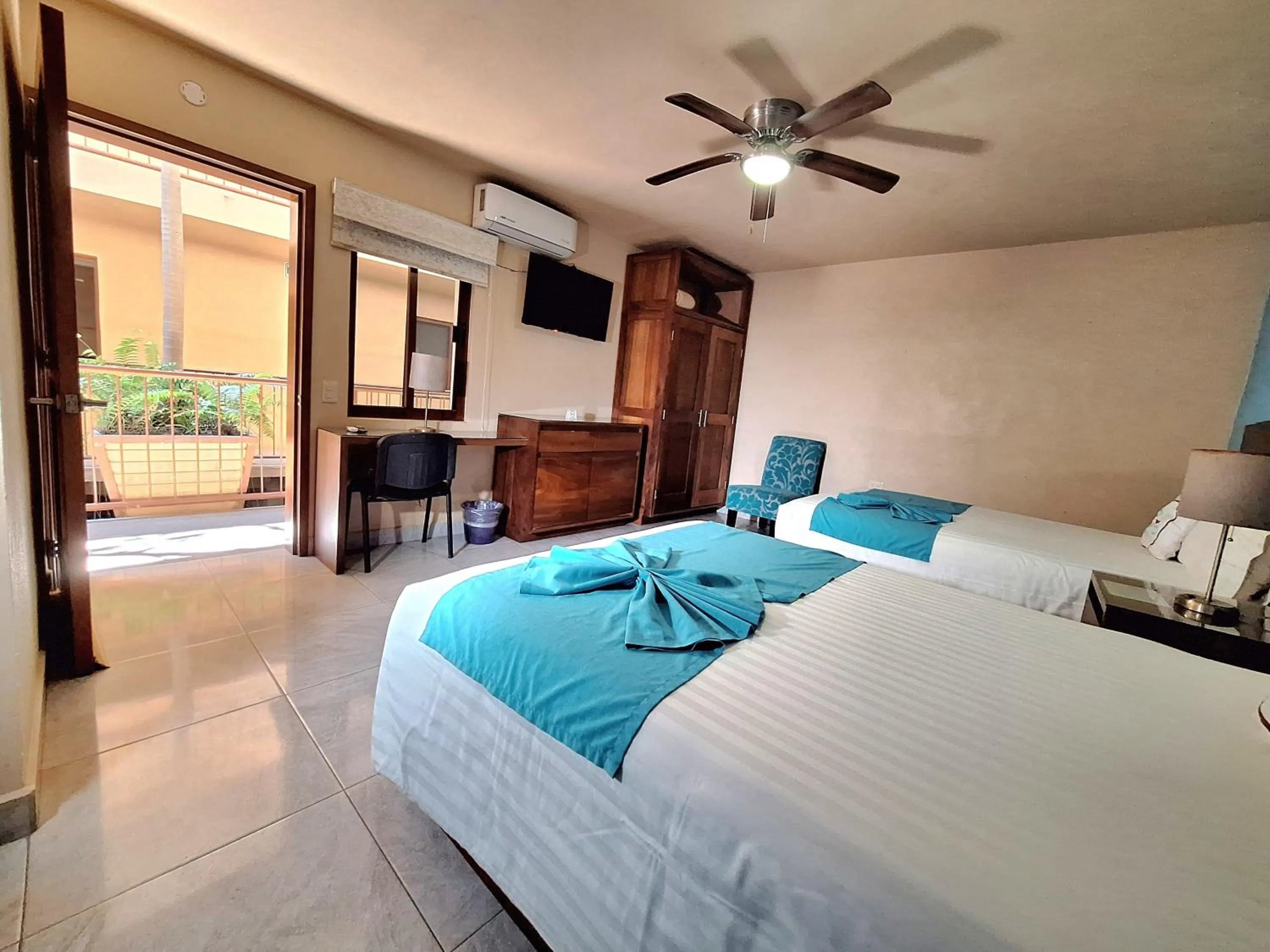 Bed in Pacific Inn hotel