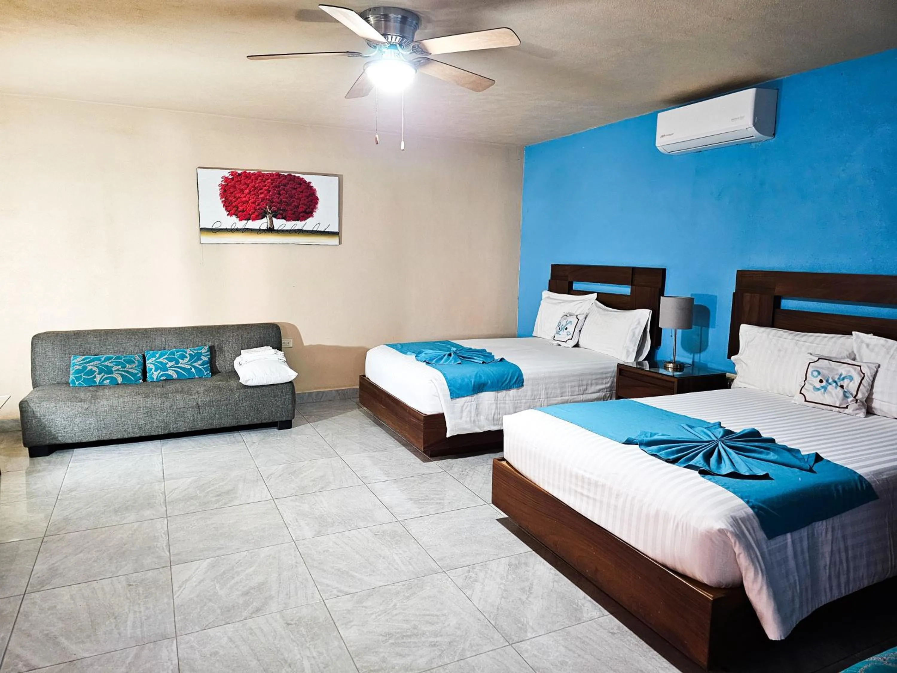 Bed in Pacific Inn hotel