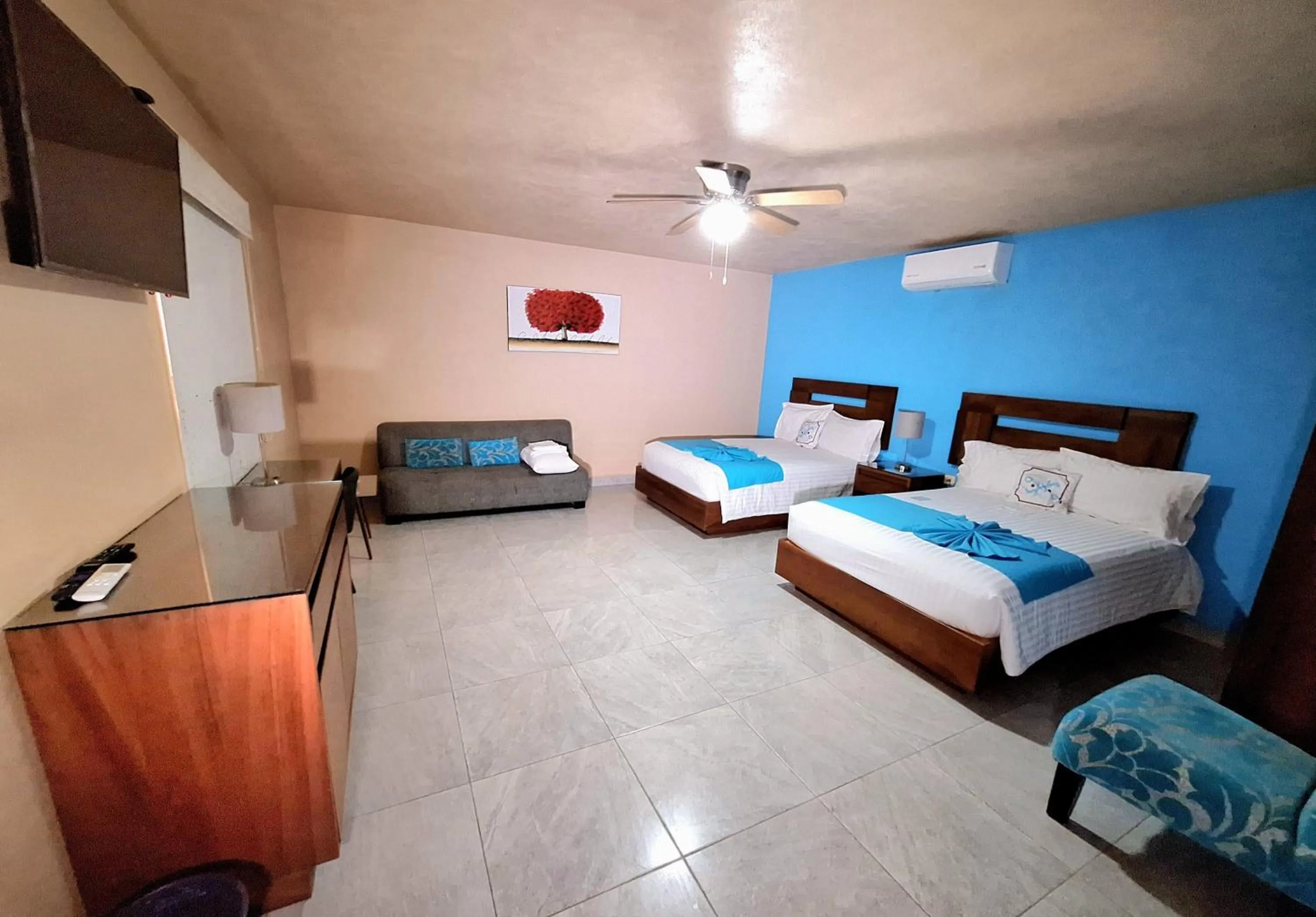 Bed in Pacific Inn hotel