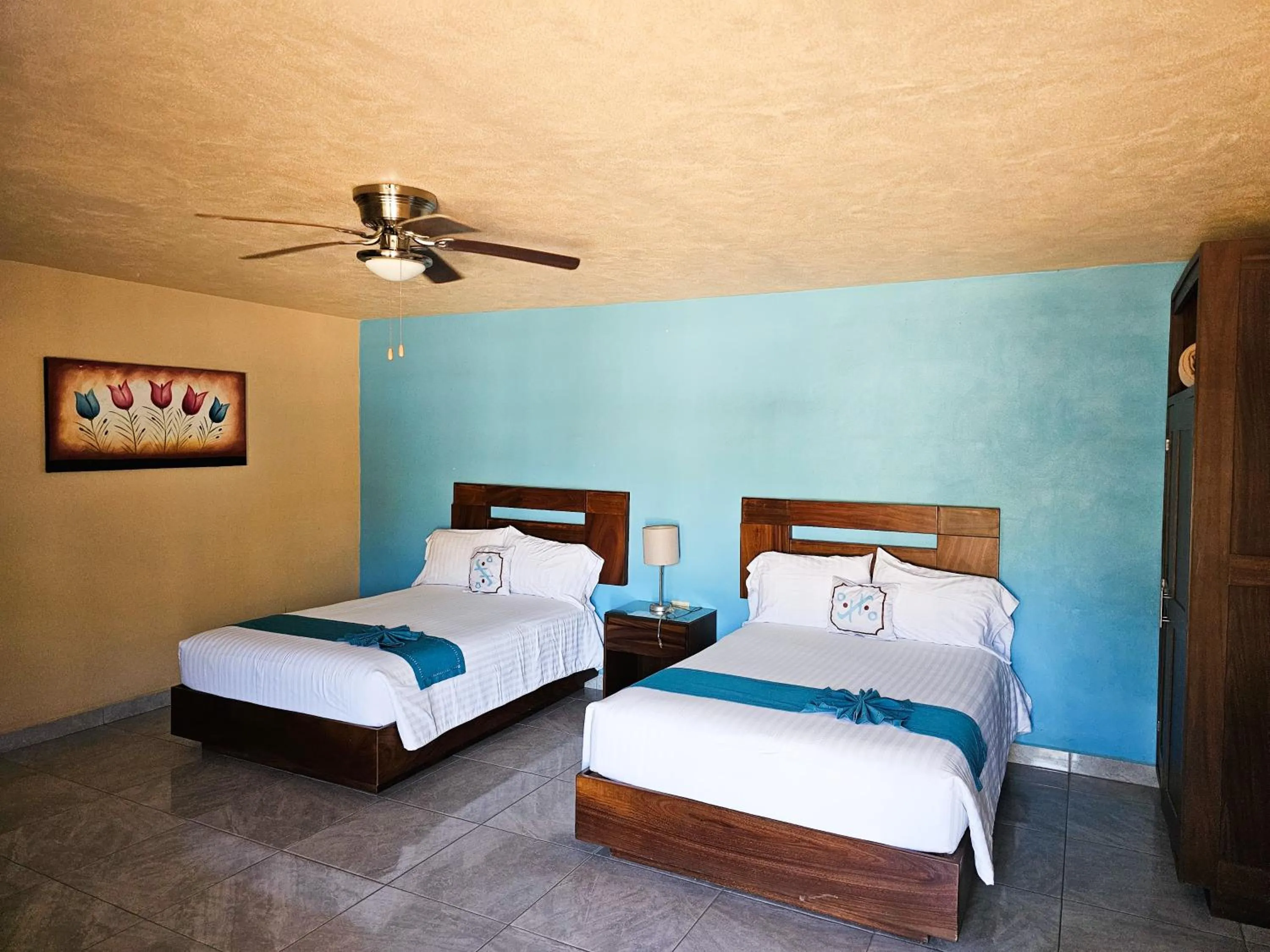 Bed in Pacific Inn hotel