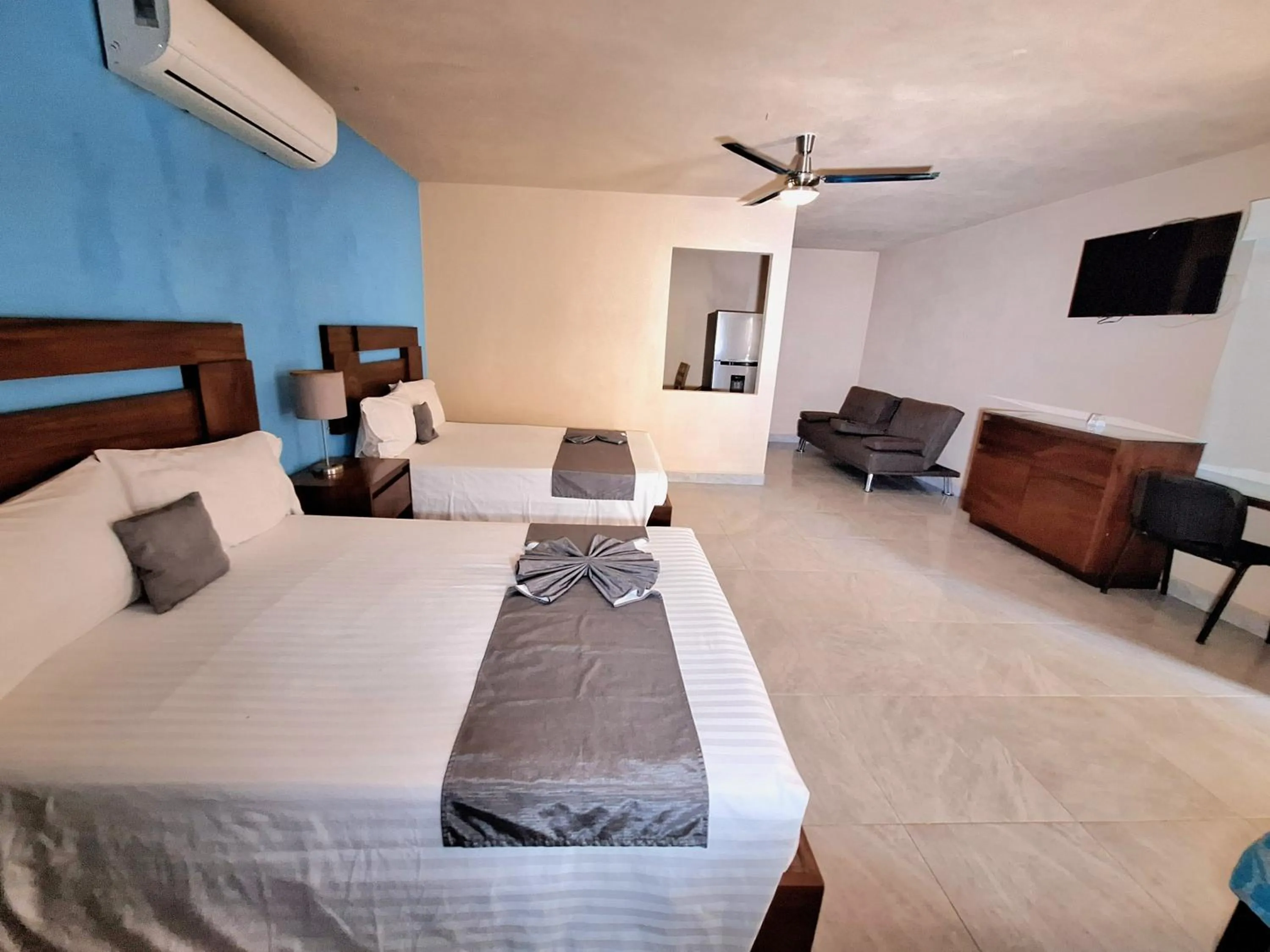 Bed in Pacific Inn hotel