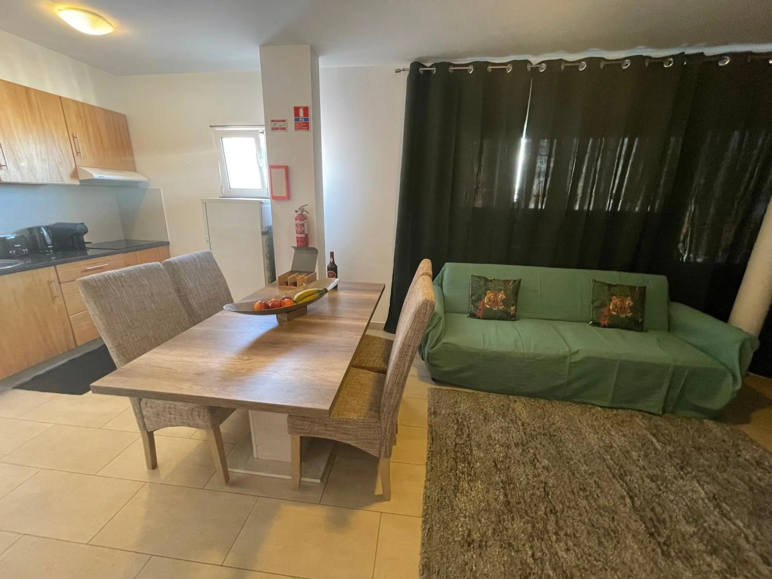 Living room in Esmeralda Holidays Apartments