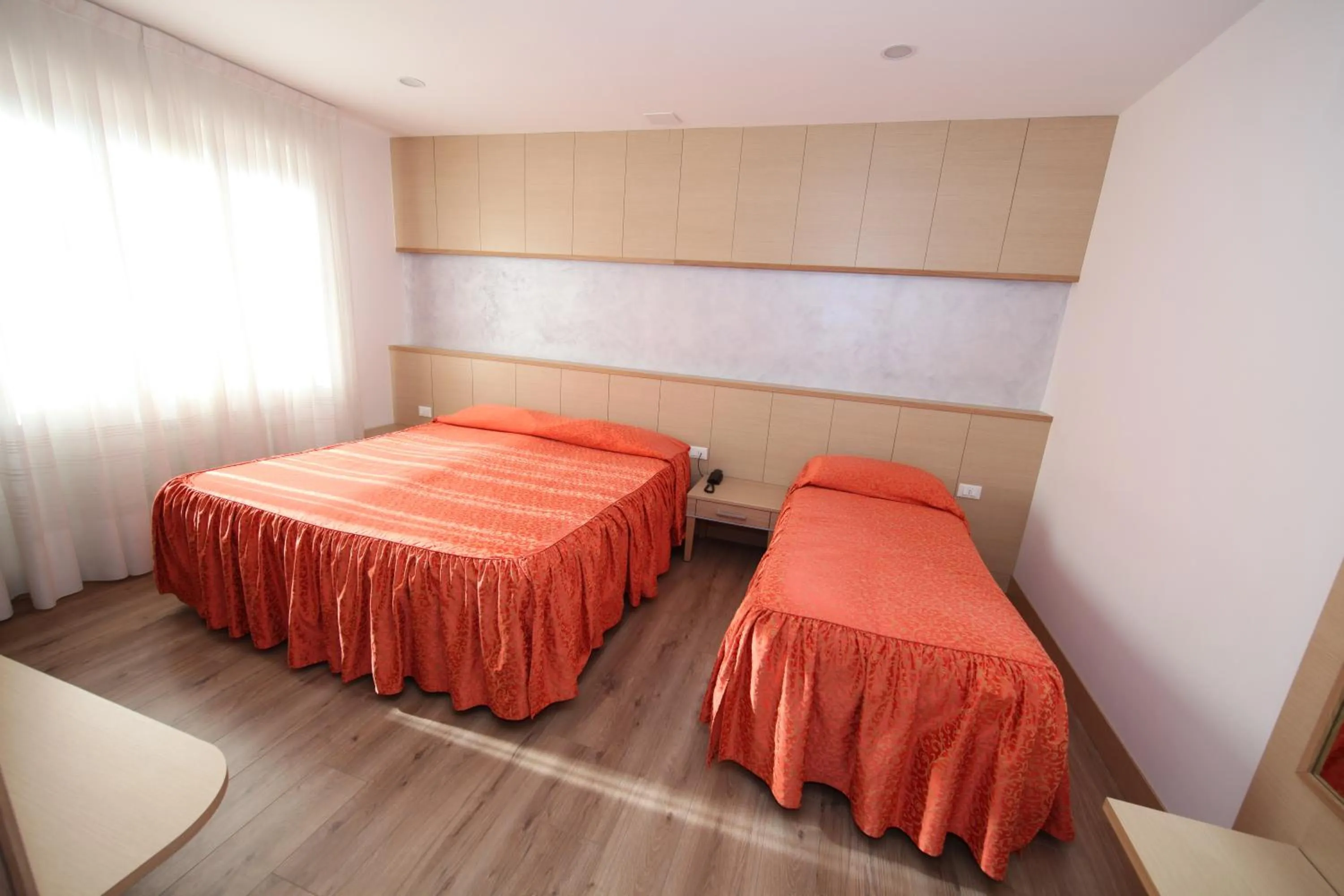 Bed in Al Benvenuto Hotel & Restaurant