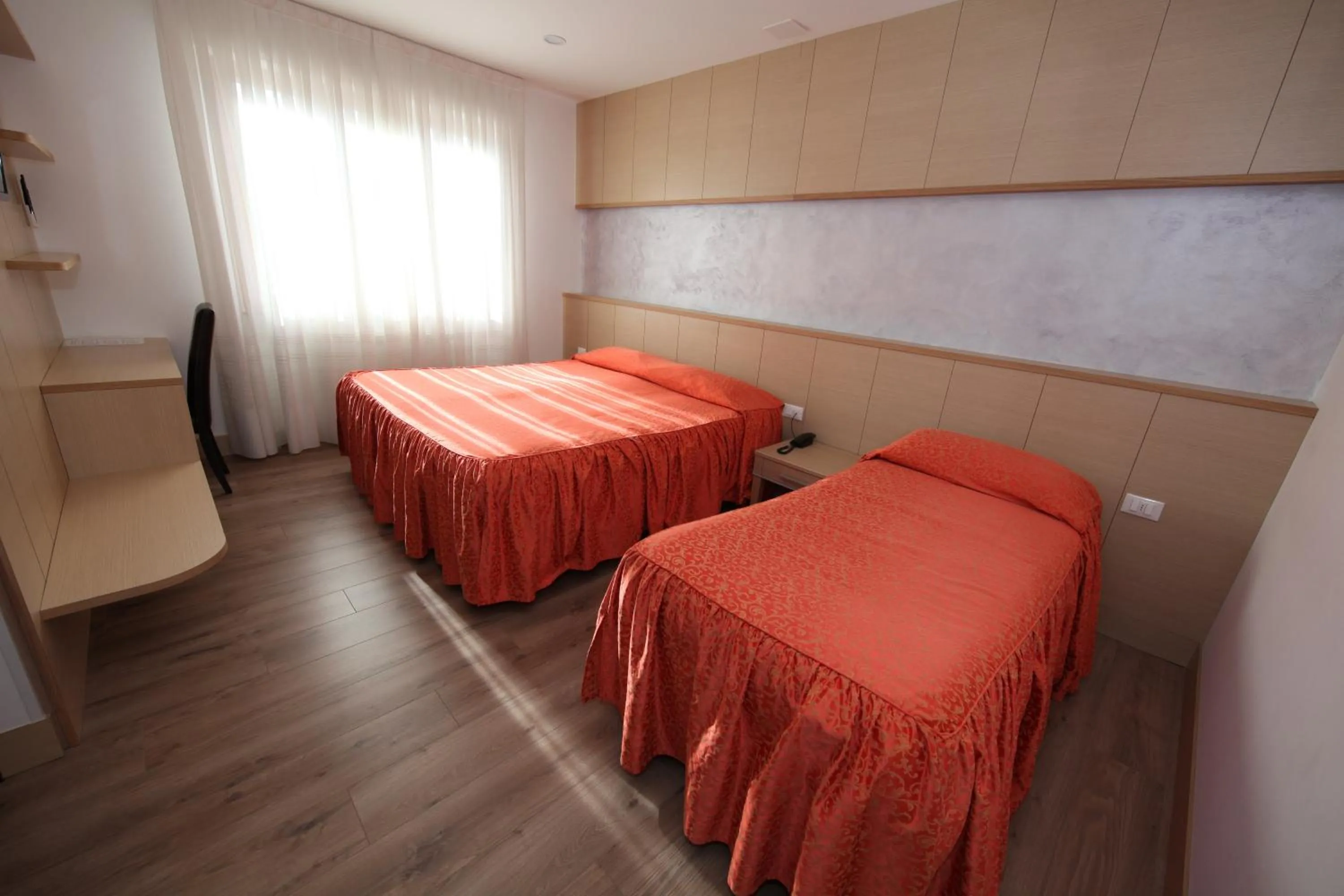 Bed in Al Benvenuto Hotel & Restaurant