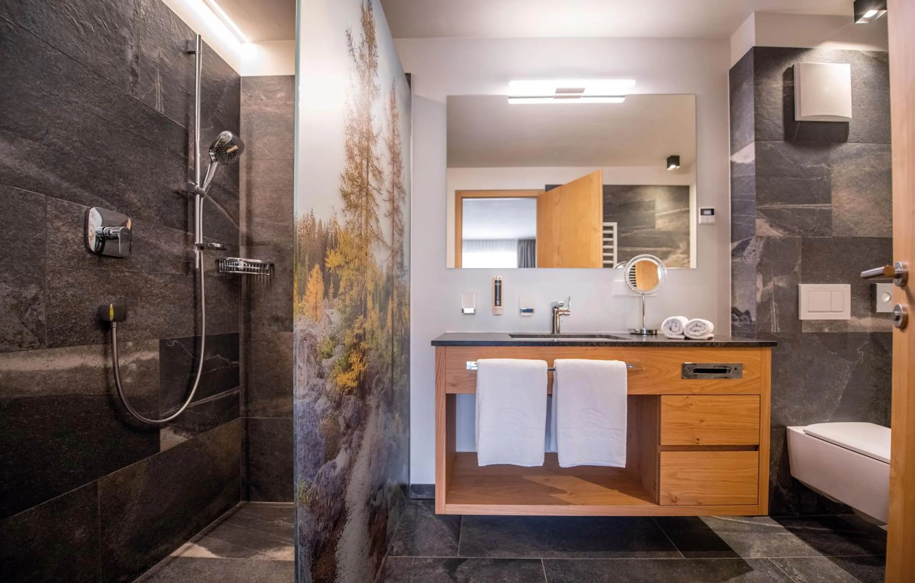 Bathroom in Hotel DAS ROYAL in Obereggen