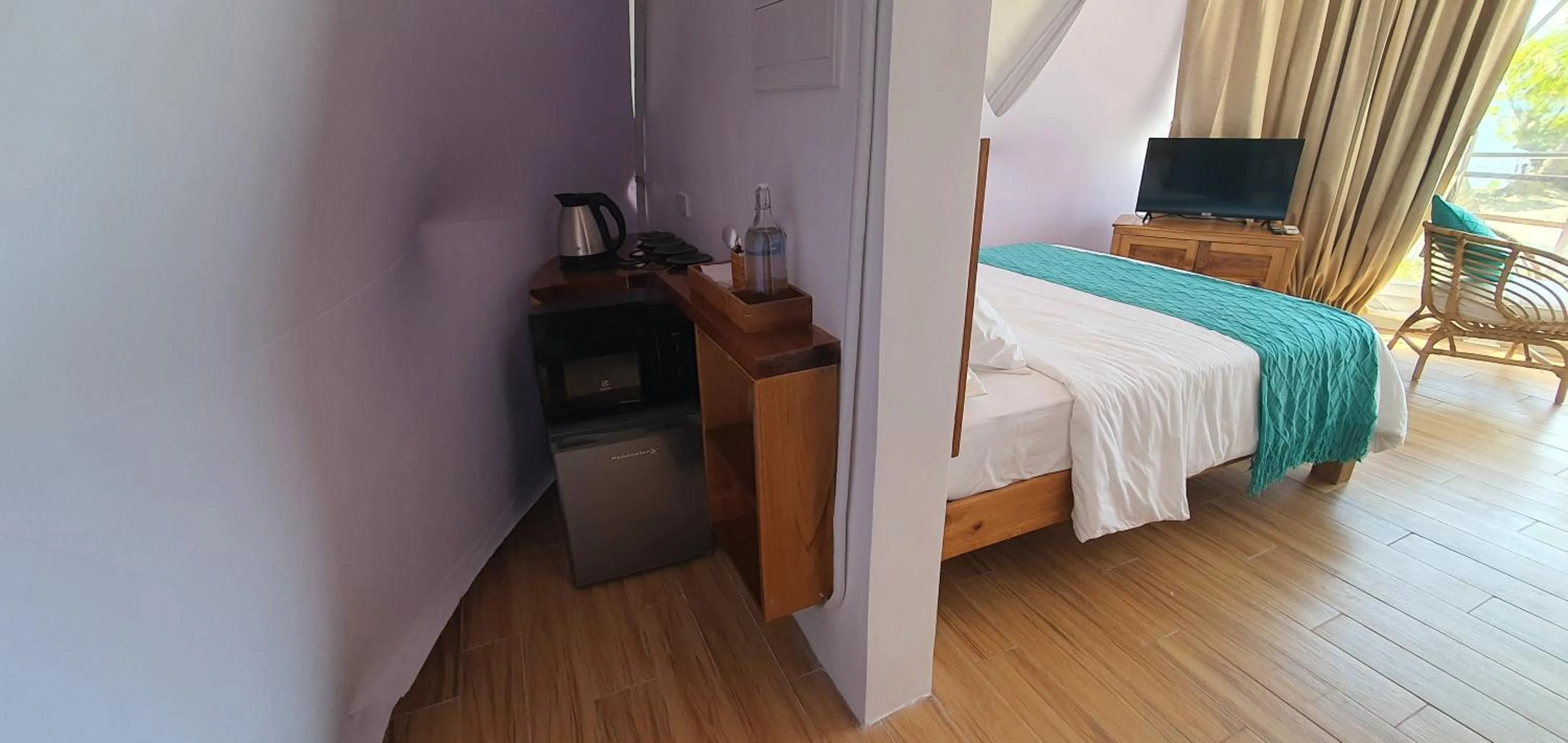 Kitchen or kitchenette, Bed in Malipaya Villas