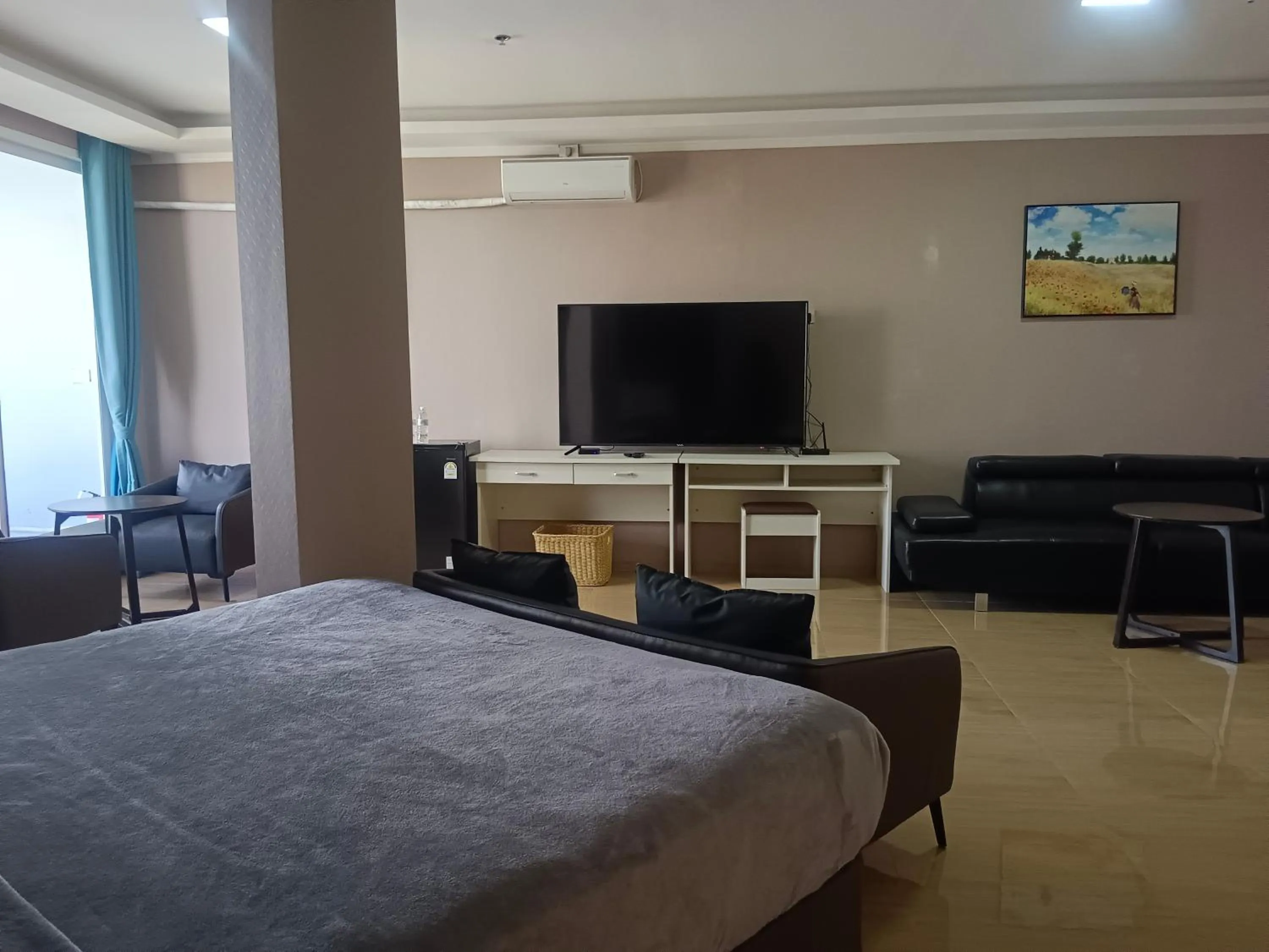 Bed in Blue Hotel and Resort