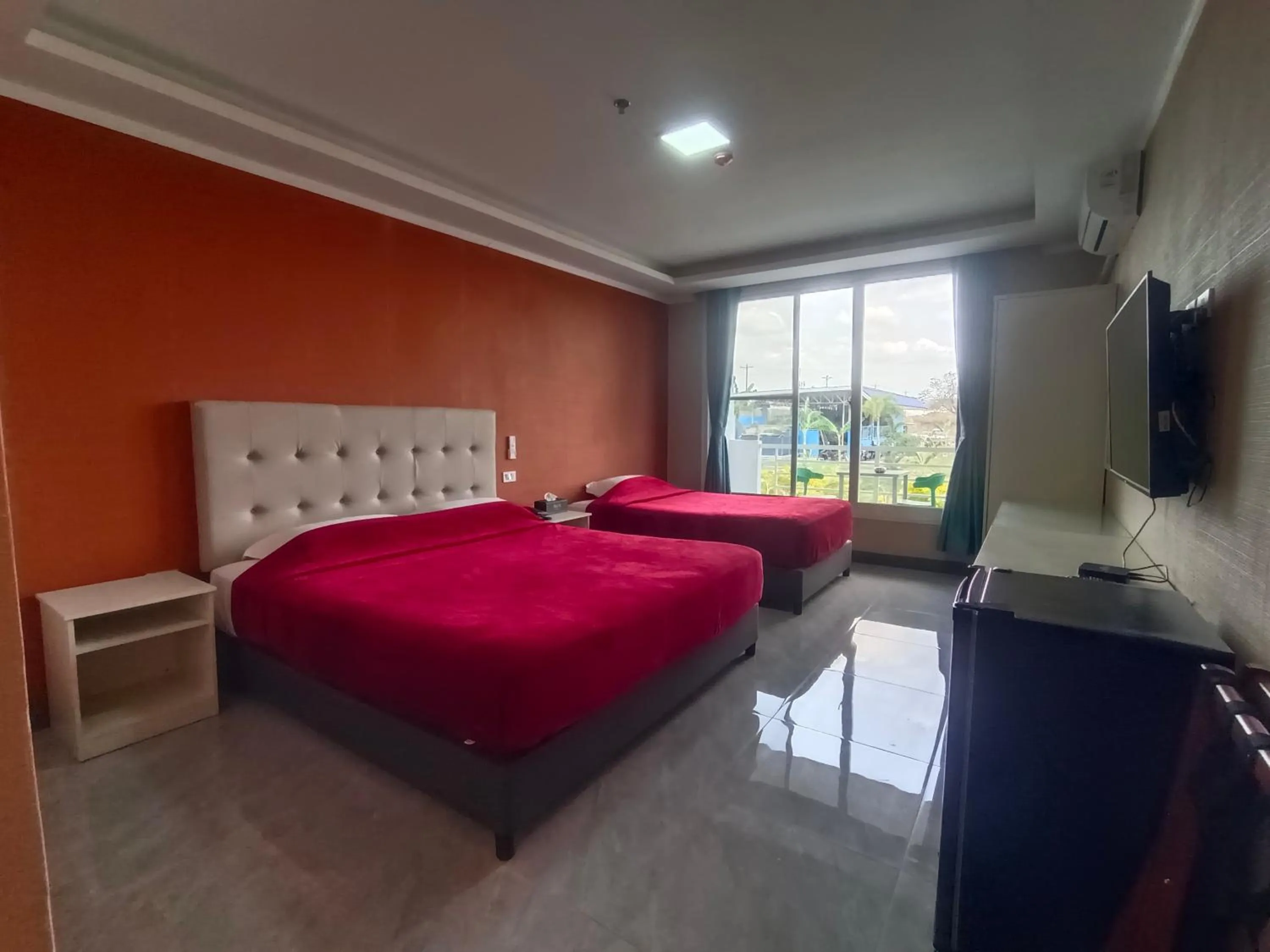 Bed in Blue Hotel and Resort