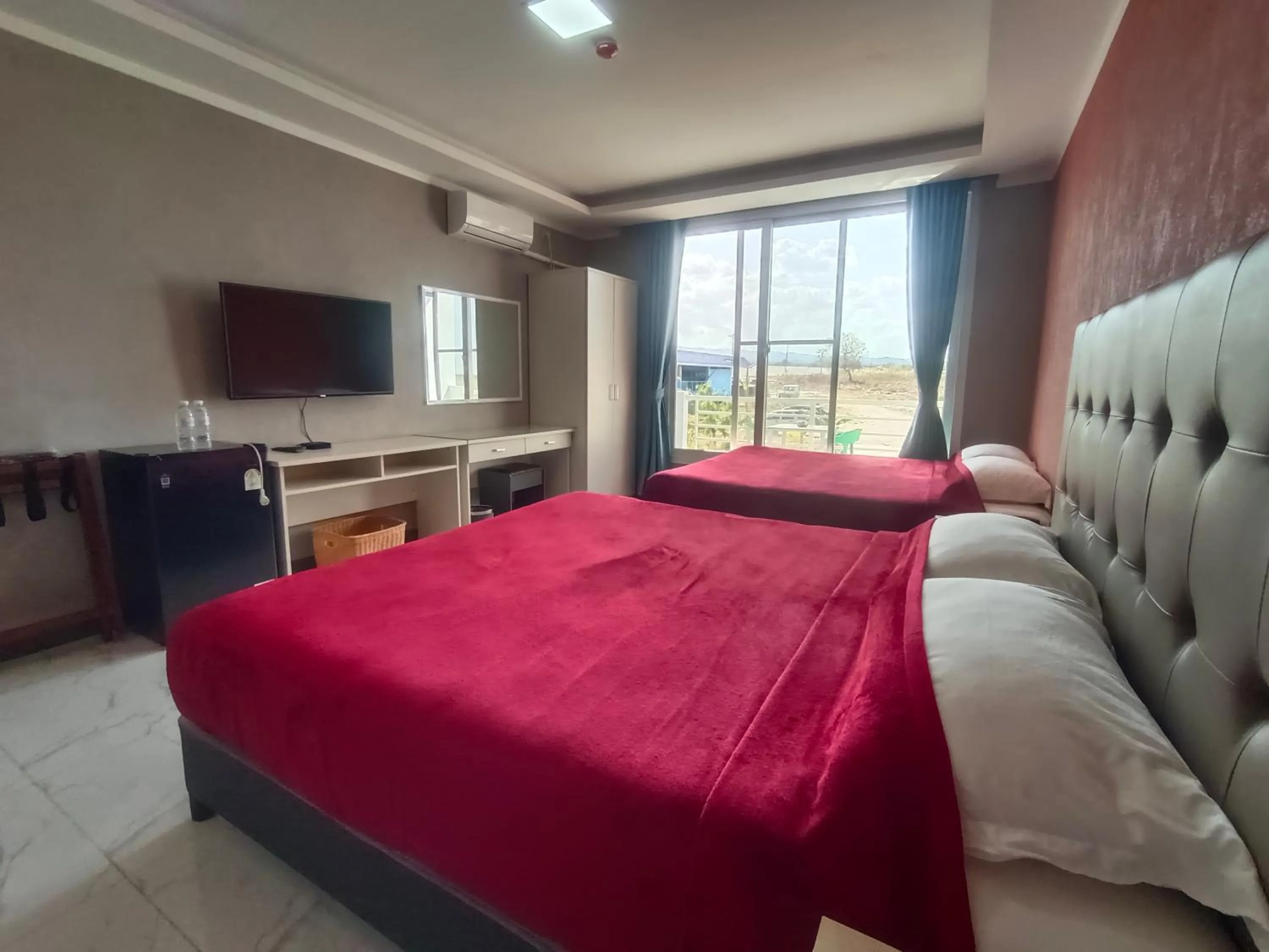 Bed in Blue Hotel and Resort