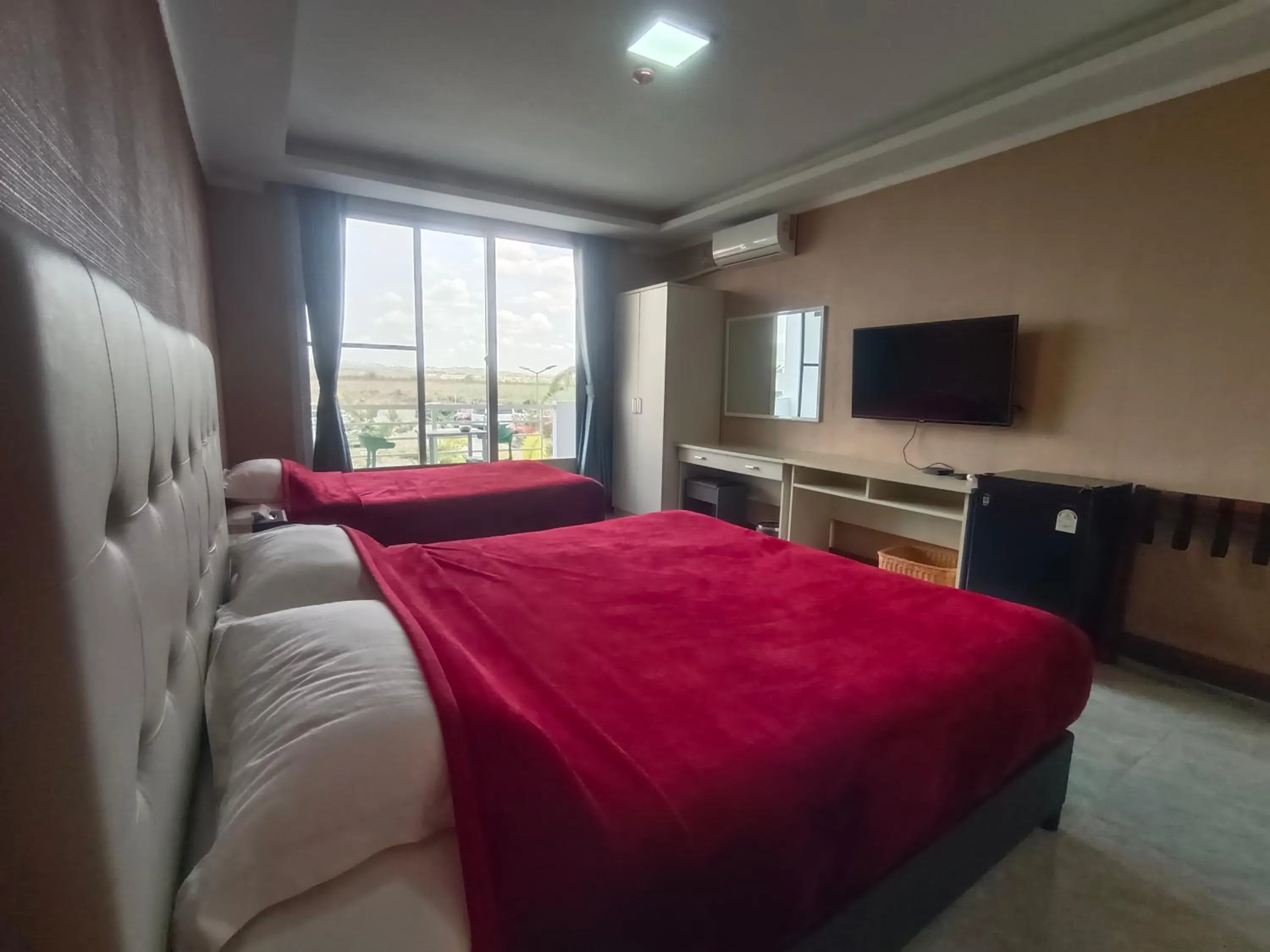 Bed in Blue Hotel and Resort