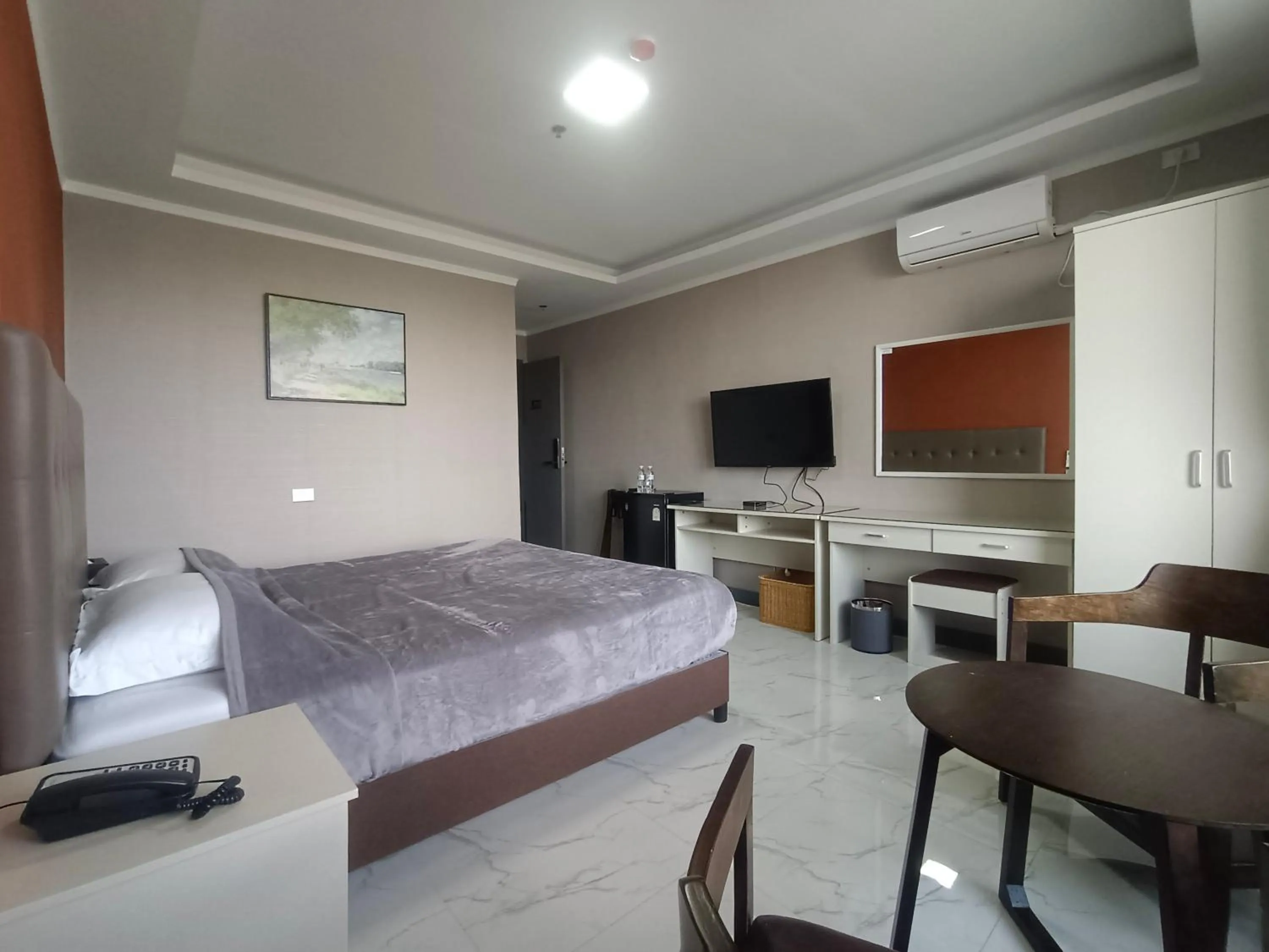 Bed in Blue Hotel and Resort