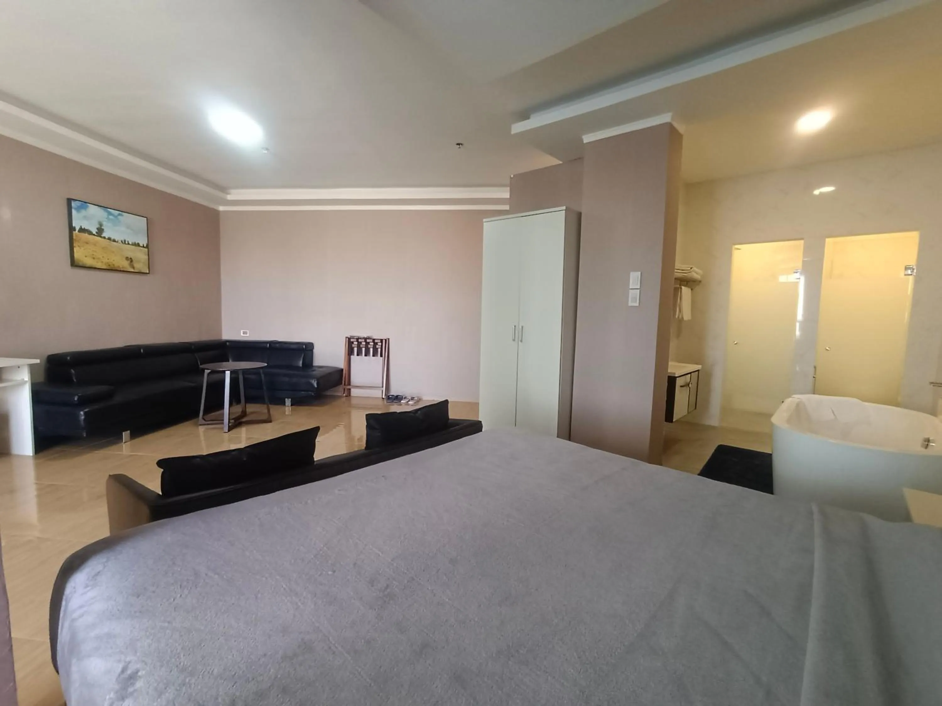 Bed in Blue Hotel and Resort