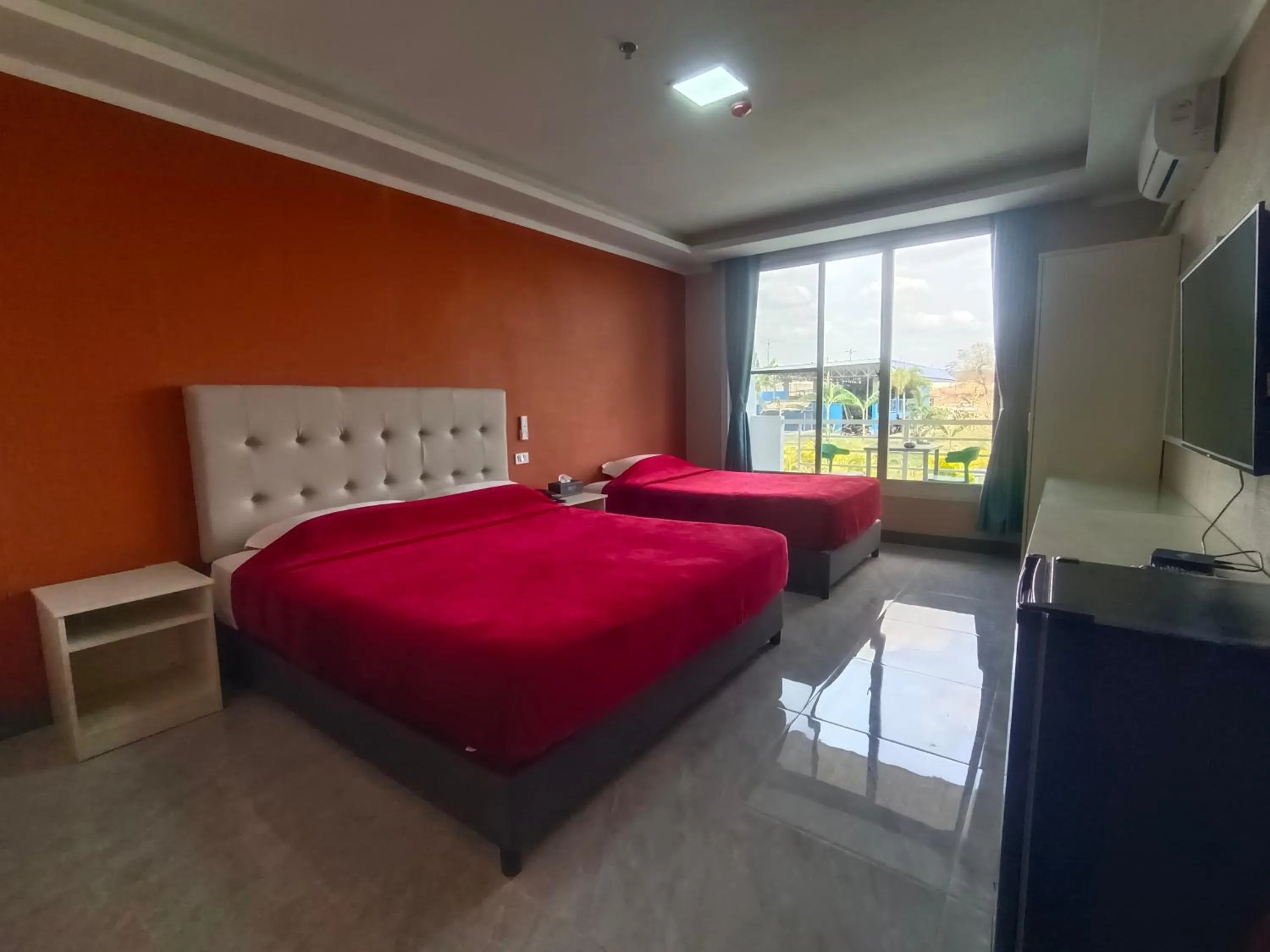 Bed in Blue Hotel and Resort