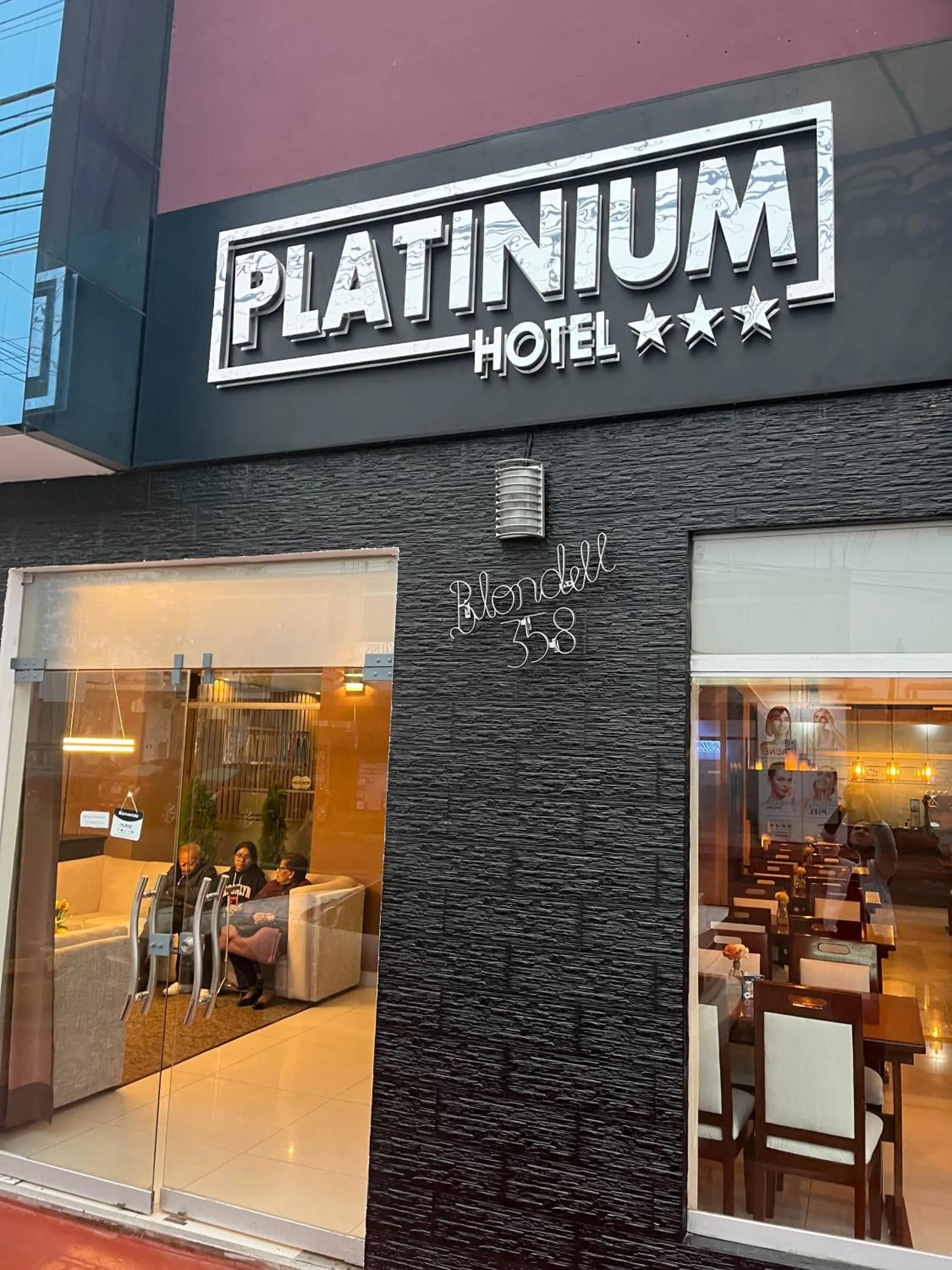 Property logo or sign in Hotel PLATINIUM