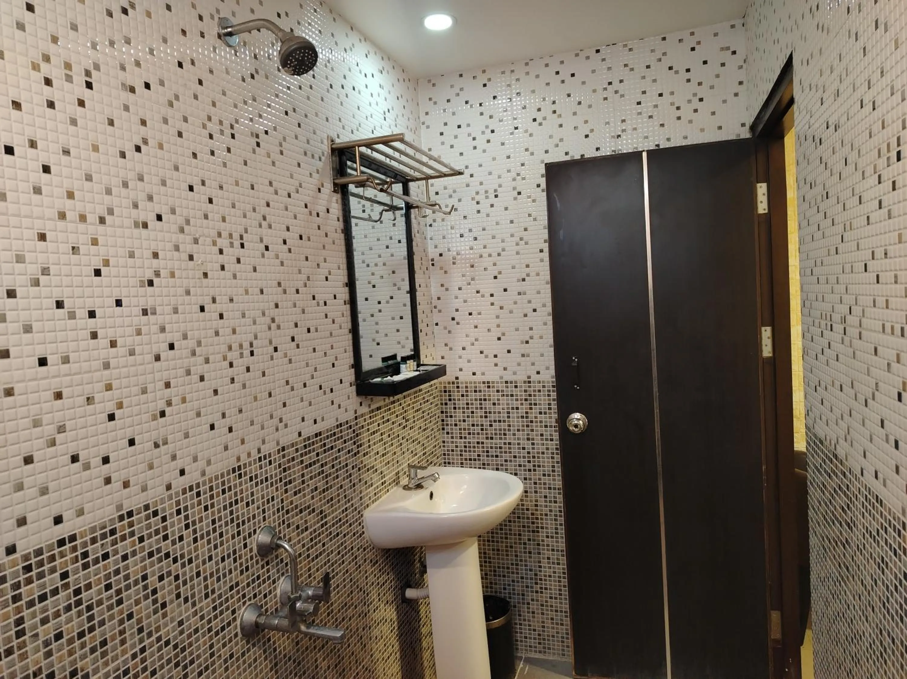 Bathroom in Coastal Grand Hotel Sampath