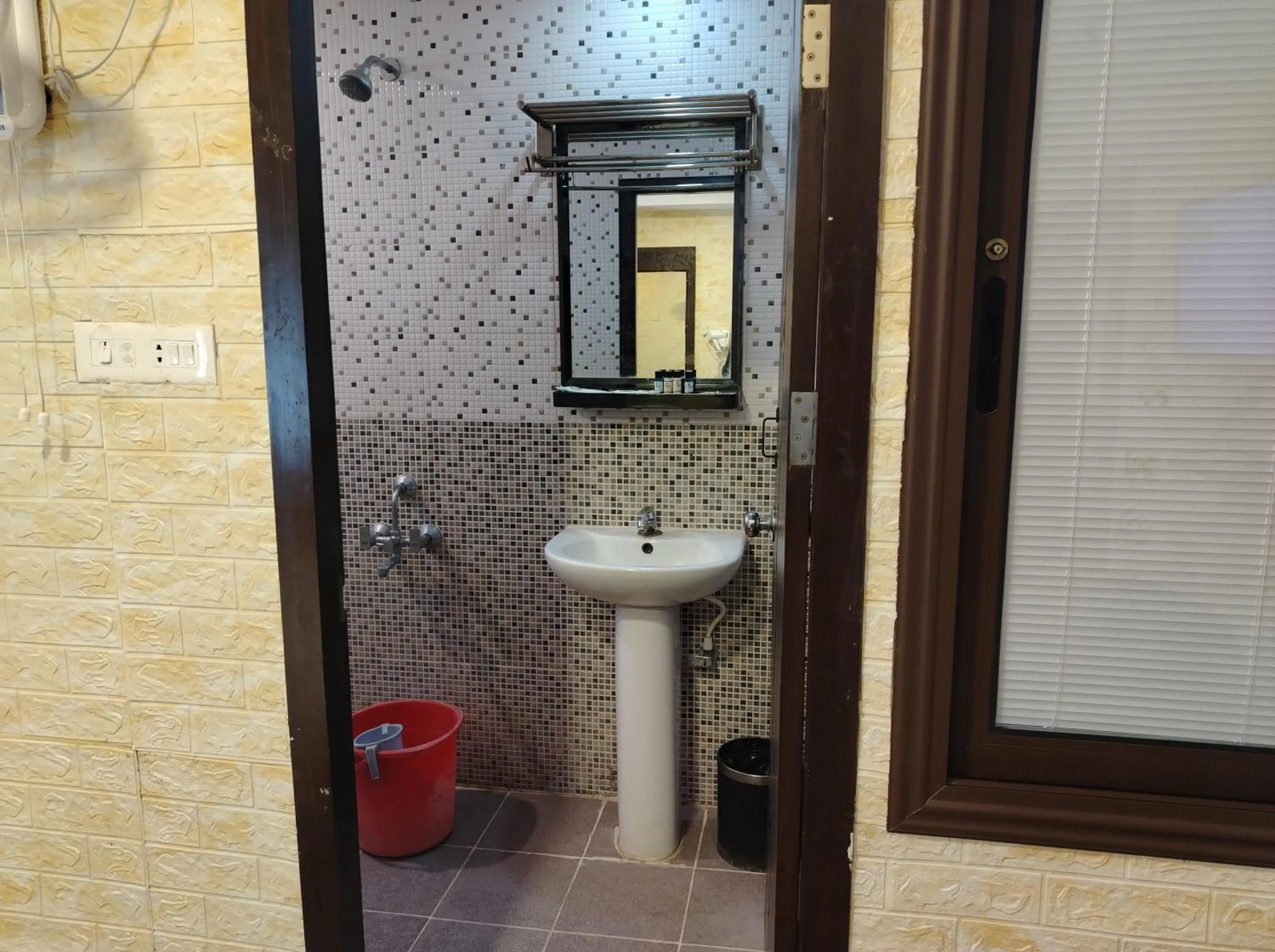 Bathroom in Coastal Grand Hotel Sampath