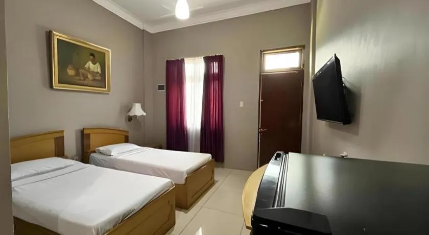 Bed in Sapadia Hotel Parapat