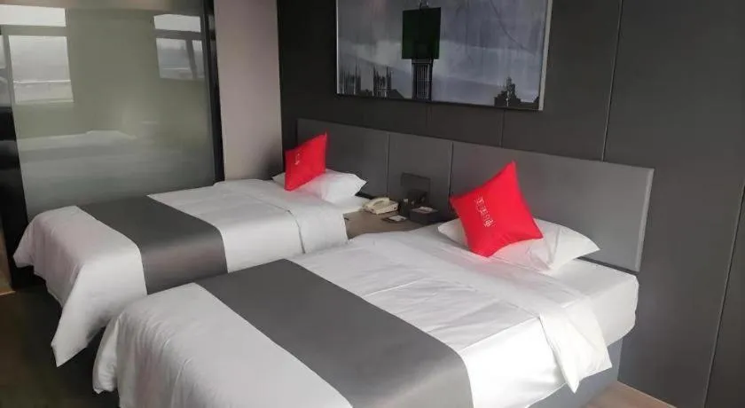 Bed in Thank Hotel Shandong Linyii Pingyi County Commerce and Trade City