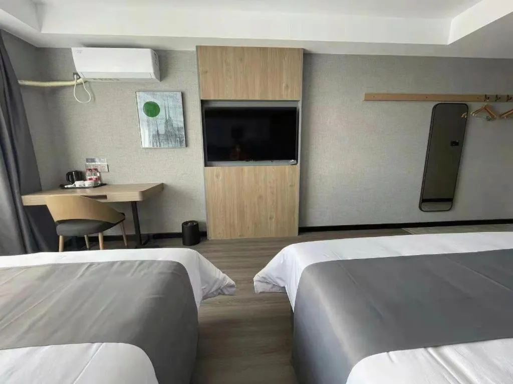 Bed in Thank Hotel Shandong Linyii Pingyi County Commerce and Trade City