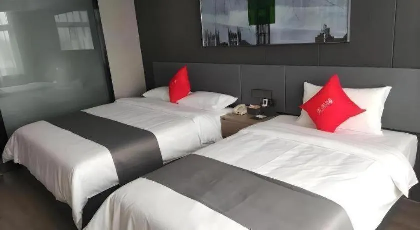 Bed in Thank Hotel Shandong Linyii Pingyi County Commerce and Trade City