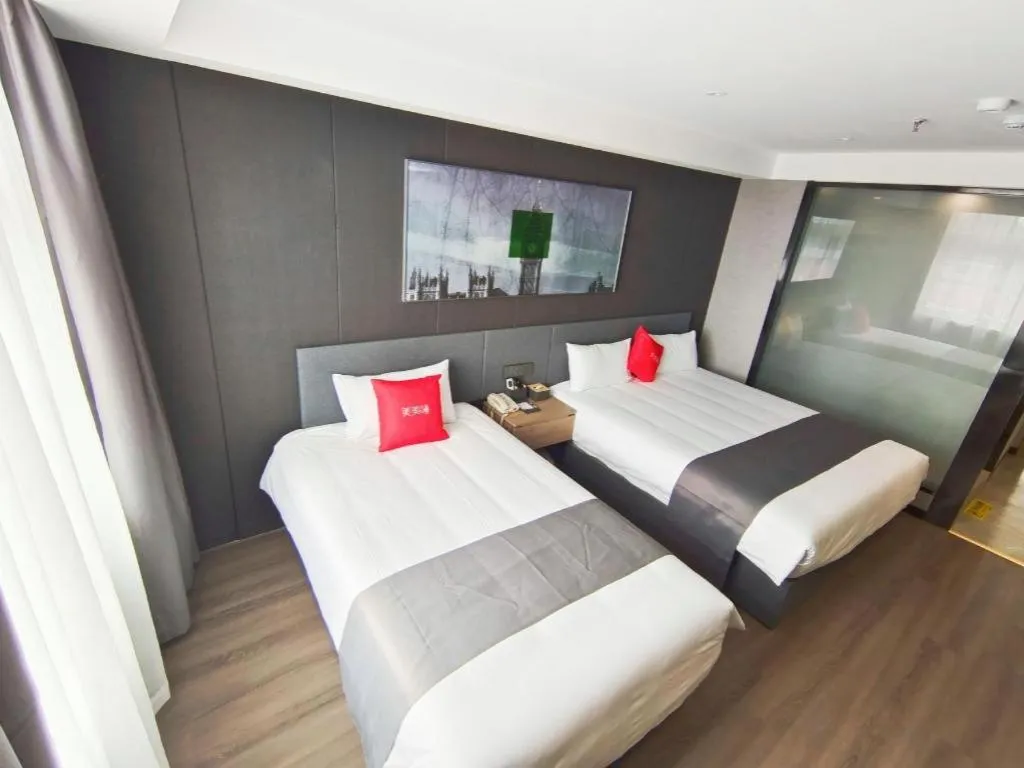 Bed in Thank Hotel Shandong Linyii Pingyi County Commerce and Trade City