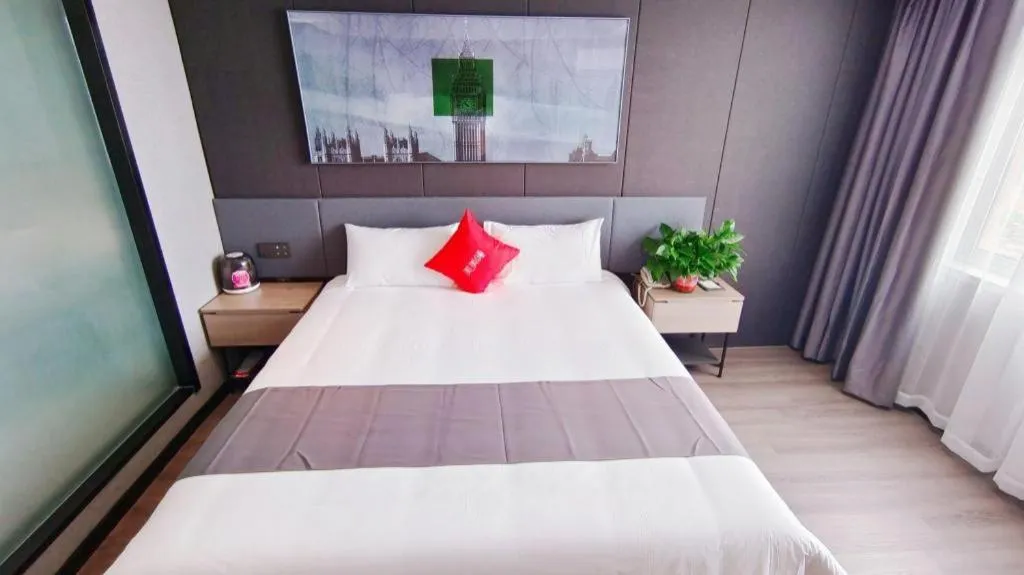 Bed in Thank Hotel Shandong Linyii Pingyi County Commerce and Trade City