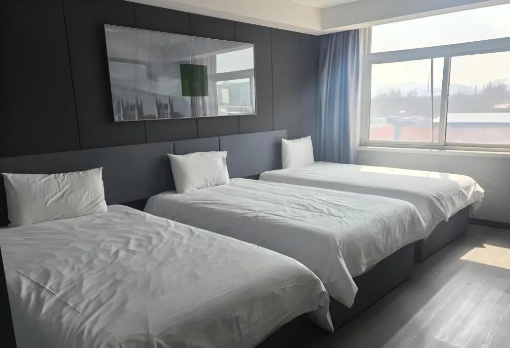 Bed in Thank Hotel Shandong Linyii Pingyi County Commerce and Trade City