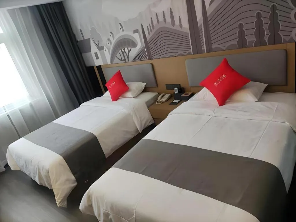 Bed in Thank Hotel Shandong Linyii Pingyi County Commerce and Trade City