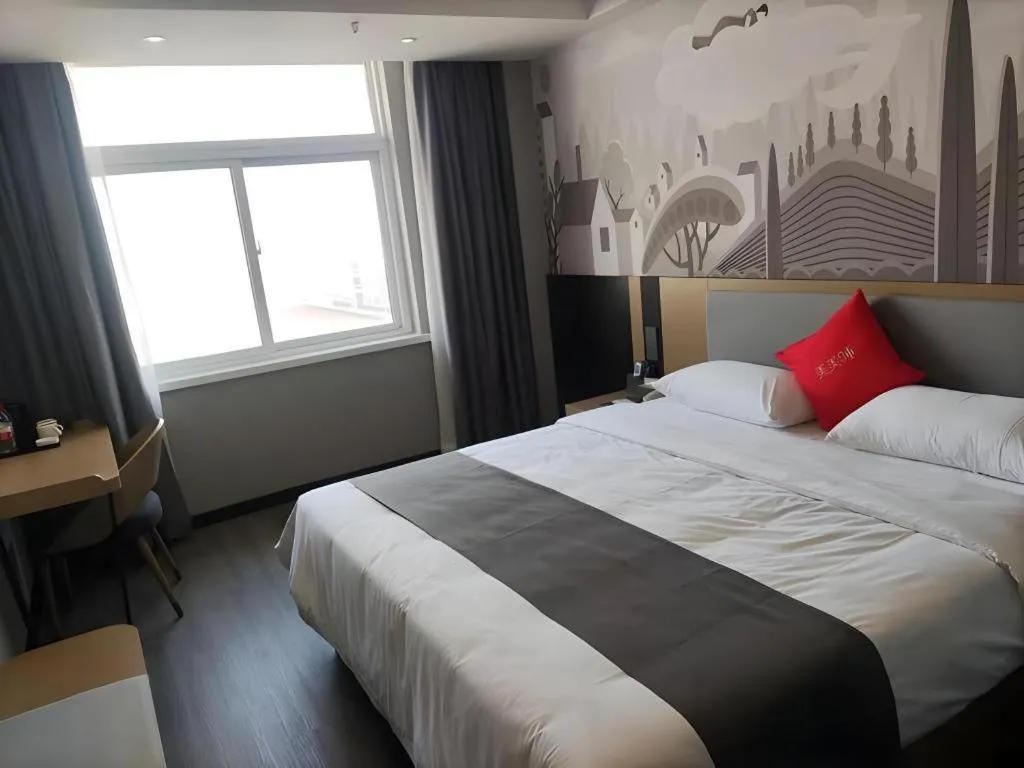 Bed in Thank Hotel Shandong Linyii Pingyi County Commerce and Trade City