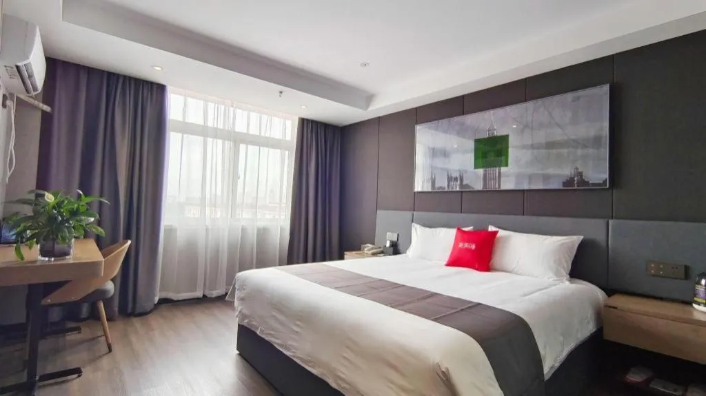 Bed in Thank Hotel Shandong Linyii Pingyi County Commerce and Trade City