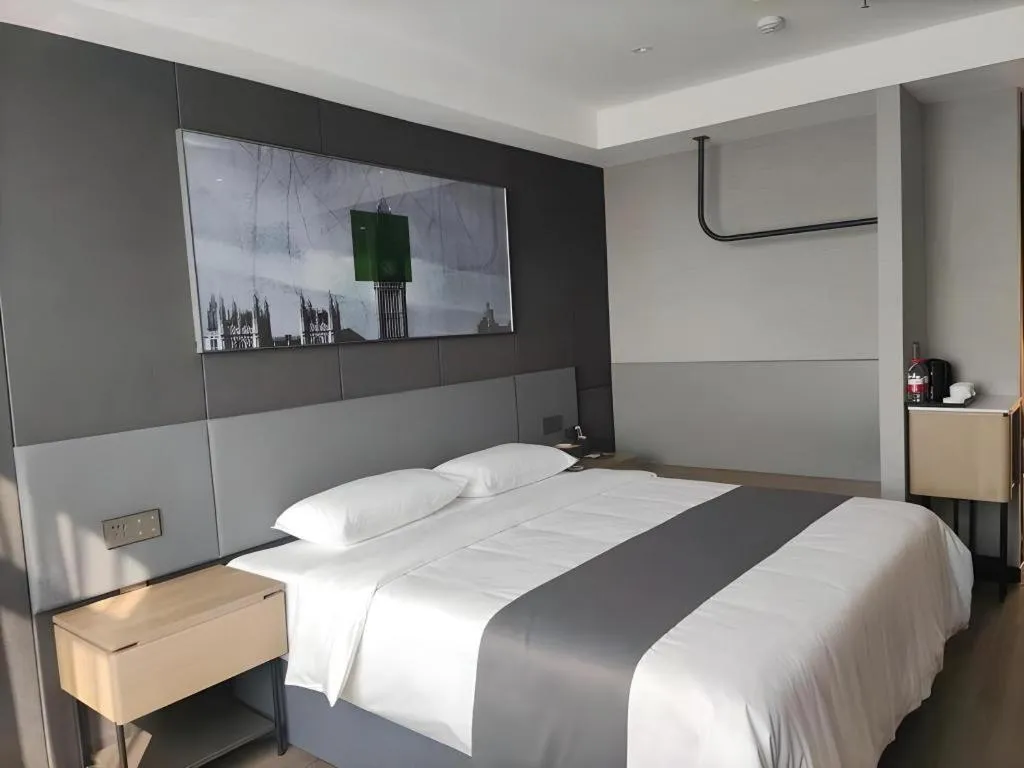 Bed in Thank Hotel Shandong Linyii Pingyi County Commerce and Trade City