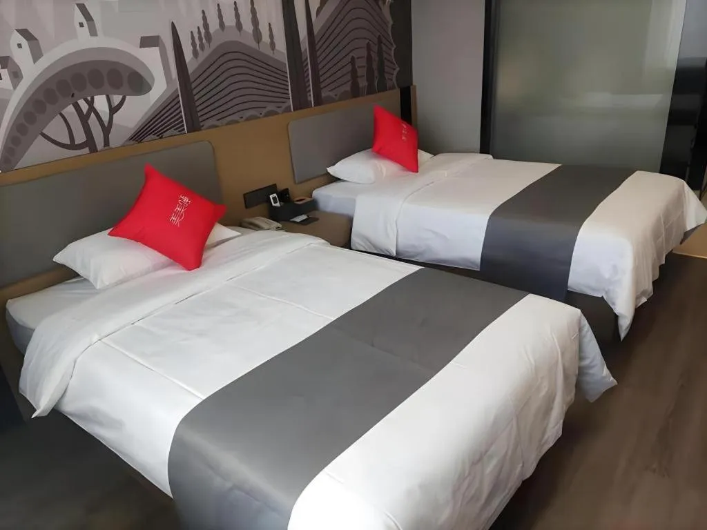 Bed in Thank Hotel Shandong Linyii Pingyi County Commerce and Trade City