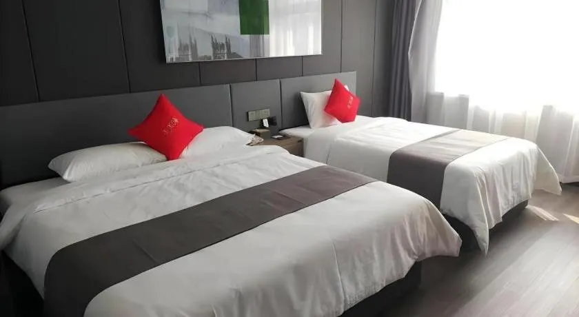 Bed in Thank Hotel Shandong Linyii Pingyi County Commerce and Trade City