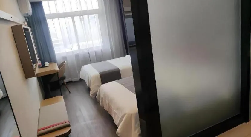 Bed in Thank Hotel Shandong Linyii Pingyi County Commerce and Trade City