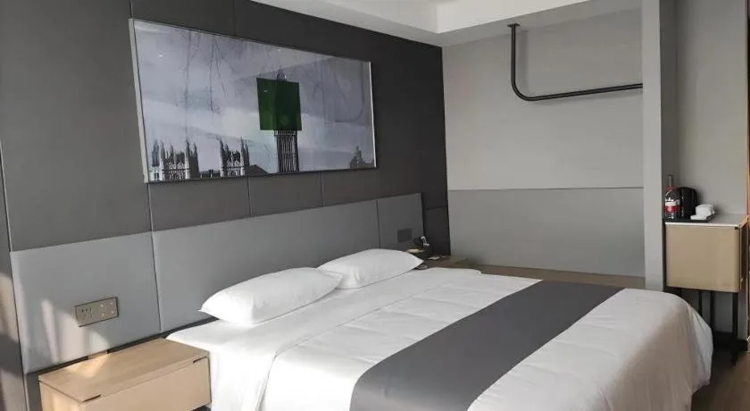 Bed in Thank Hotel Shandong Linyii Pingyi County Commerce and Trade City