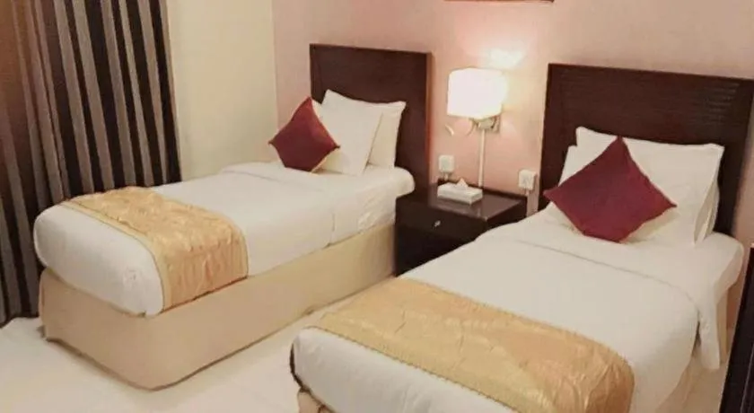 Bed in Lotus Furnished Hotel Apartments LLC. Ajman