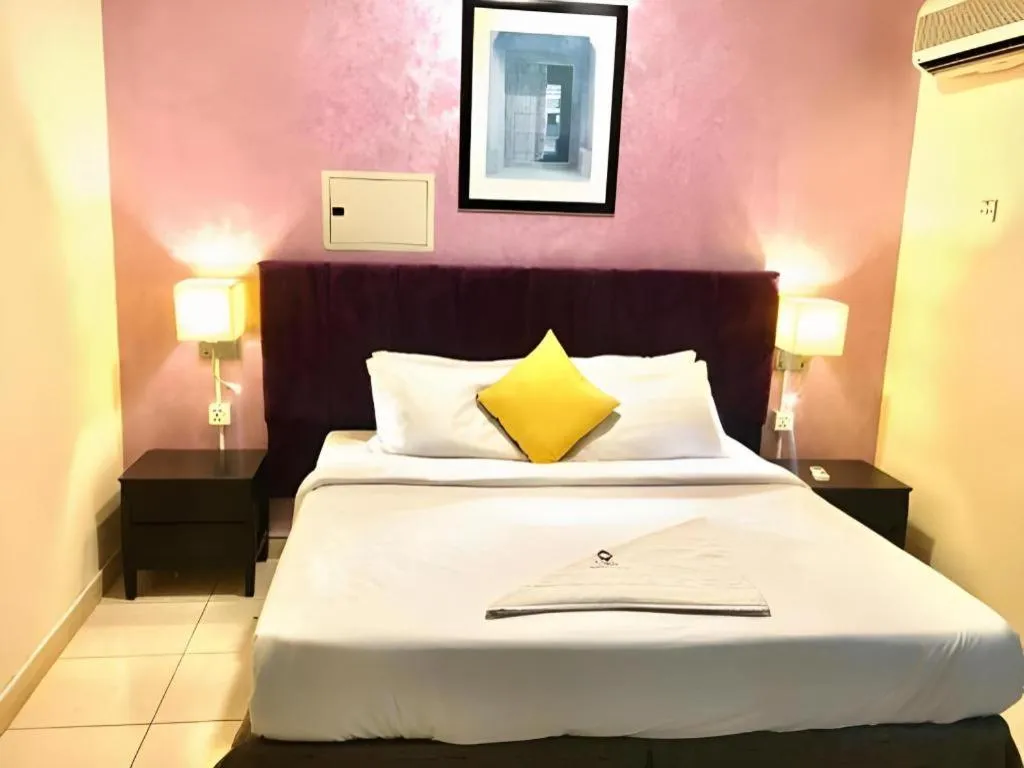 Bed in Lotus Furnished Hotel Apartments LLC. Ajman